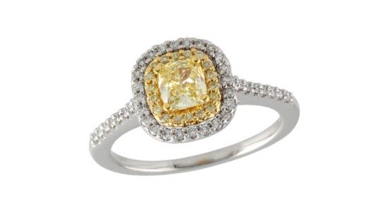 A mixed metal fashion ring featuring a princess cut yellow diamond and two row of diamond halo accents