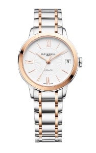 A stainless steel watch for women features gold-tone details