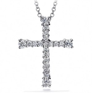 A diamond-encrusted cross pendant from Hearts On Fire