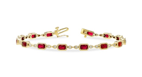 A yellow gold line bracelet set with rubies and diamonds