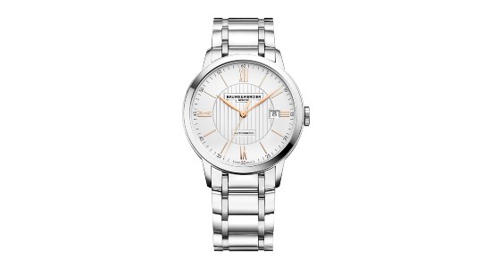 a platinum watch featuring a white dial and rose gold hands and indices