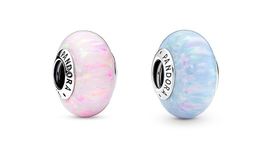 two opal Pandora bracelet charms, one pink and one blue
