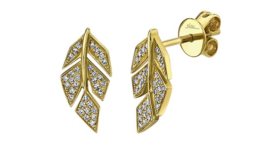 a pair of yellow gold stud earrings featuring leaf motifs dotted with diamonds