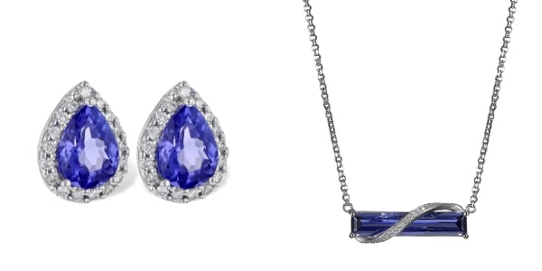 a pair of white gold stud earrings featuring pear shaped tanzanite next to a white gold tanzanite pendant