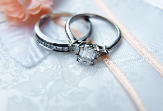white gold side stone rings from Rumanoff's Jewelers white gold side stone rings from Rumanoff's Jewelers